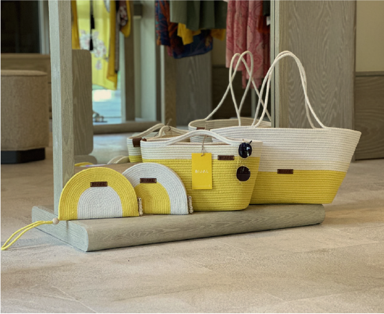 A display of yellow and white baskets in a store